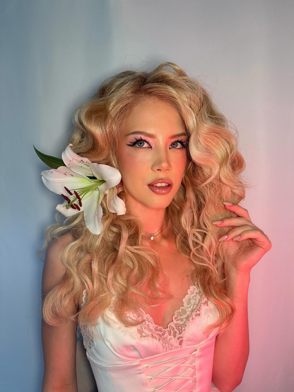 Romantic editorial with lily and voluminous curls